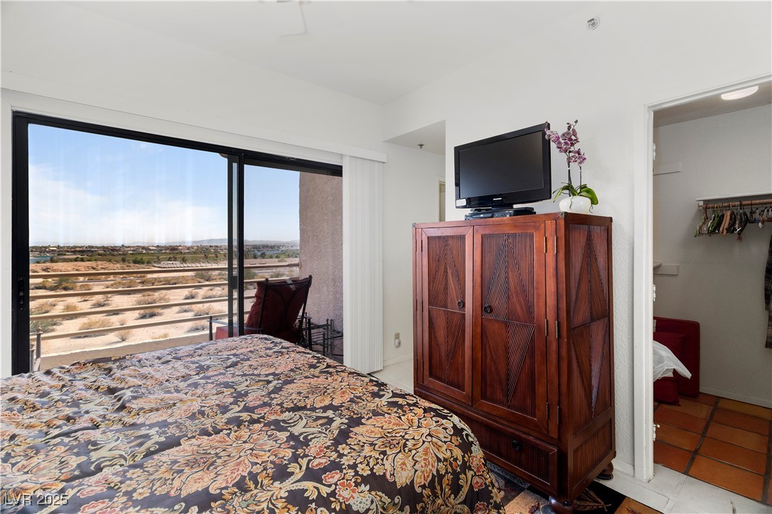 3859 Desert Marina Drive, Unit 257 Laughlin, NV 89029 - Photo 24 of 89 Primary Bedroom with access to outside and light t