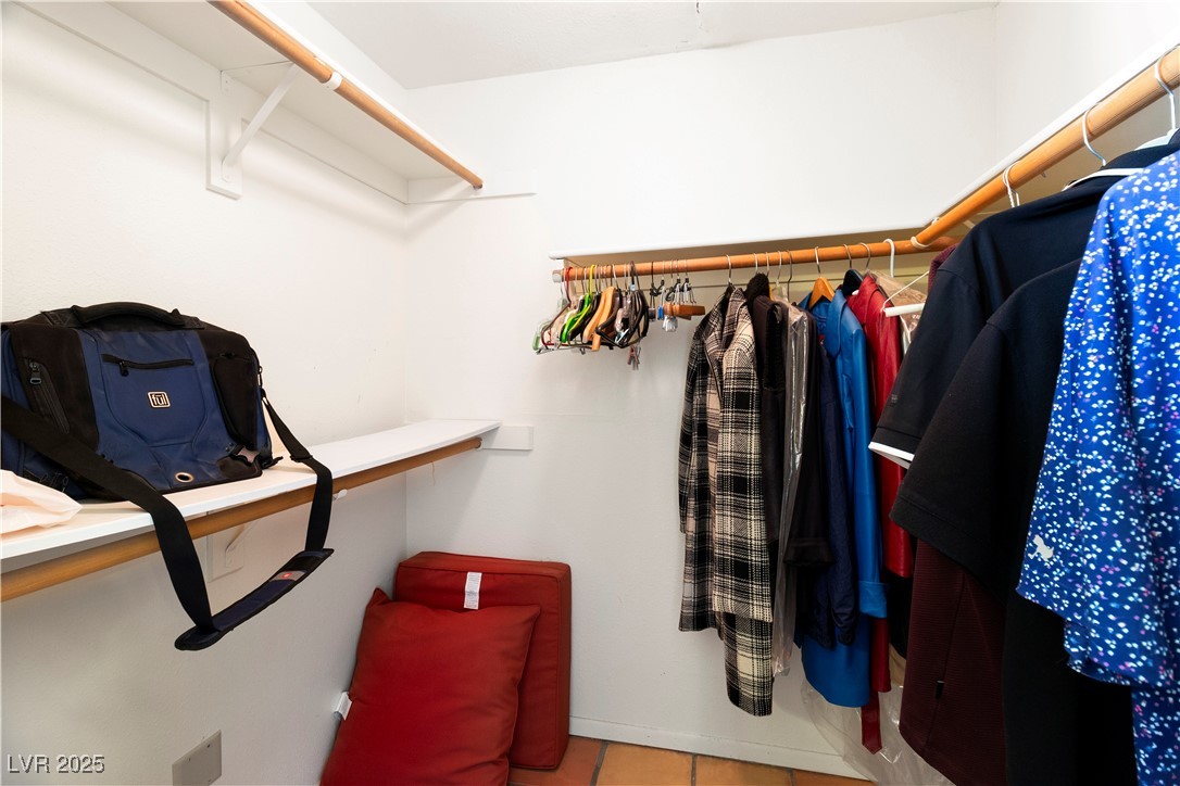 3859 Desert Marina Drive, Unit 257 Laughlin, NV 89029 - Photo 25 of 89 Spacious walk-in closet in Primary Bedroom with ti