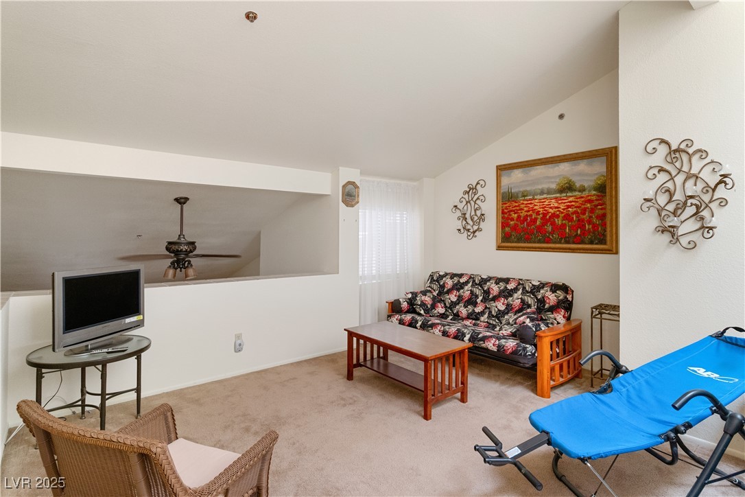 3859 Desert Marina Drive, Unit 257 Laughlin, NV 89029 - Photo 41 of 89 Carpeted Upstairs Loft living room featuring vault