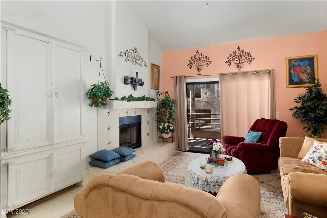 3859 Desert Marina Drive, Unit 257 Laughlin, NV 89029 - Photo 5 of 89 Tiled living area featuring a fireplace