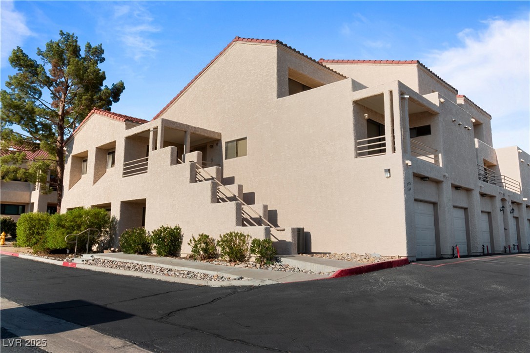 3859 Desert Marina Drive, Unit 257 Laughlin, NV 89029 - Photo 56 of 89 View of property exterior featuring stucco siding,