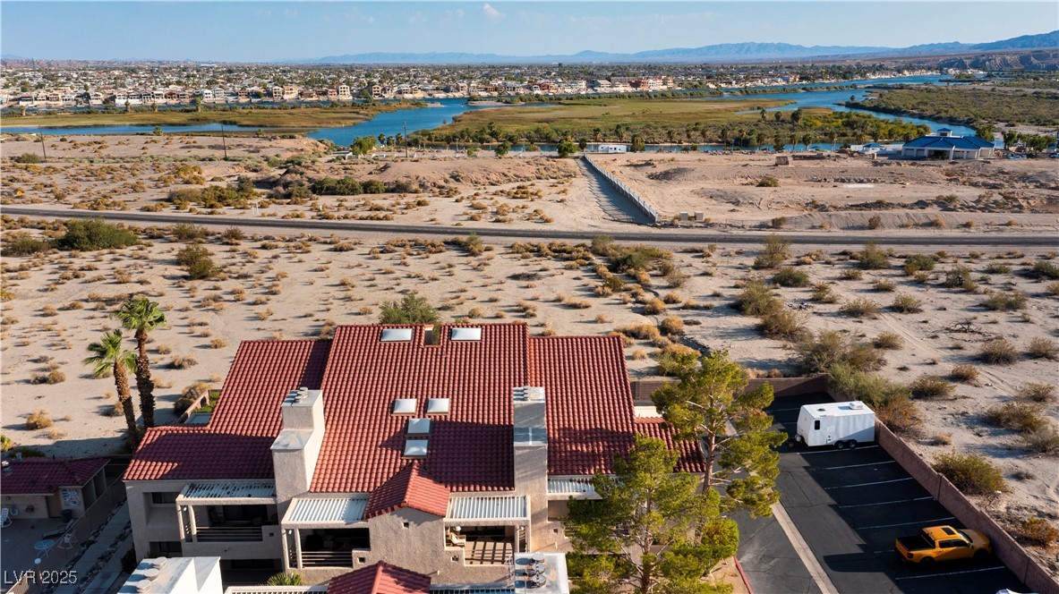 3859 Desert Marina Drive, Unit 257 Laughlin, NV 89029 - Photo 71 of 89 Aerial perspective of suburban area with a mountai