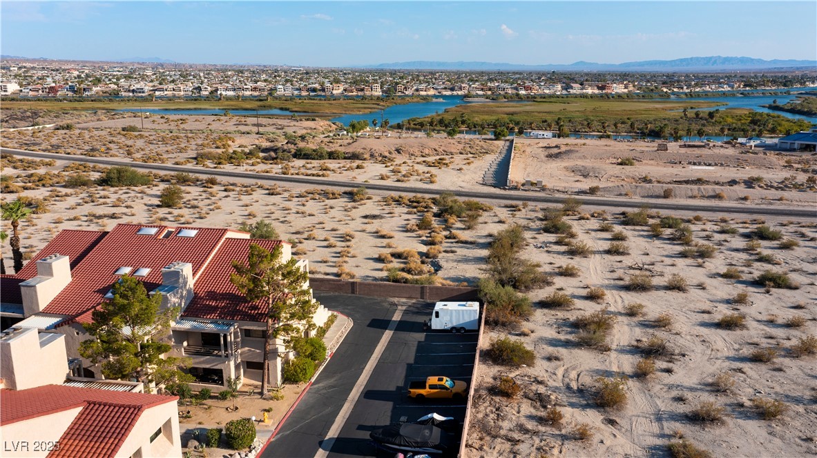 3859 Desert Marina Drive, Unit 257 Laughlin, NV 89029 - Photo 72 of 89 Aerial perspective of suburban area with a mountai