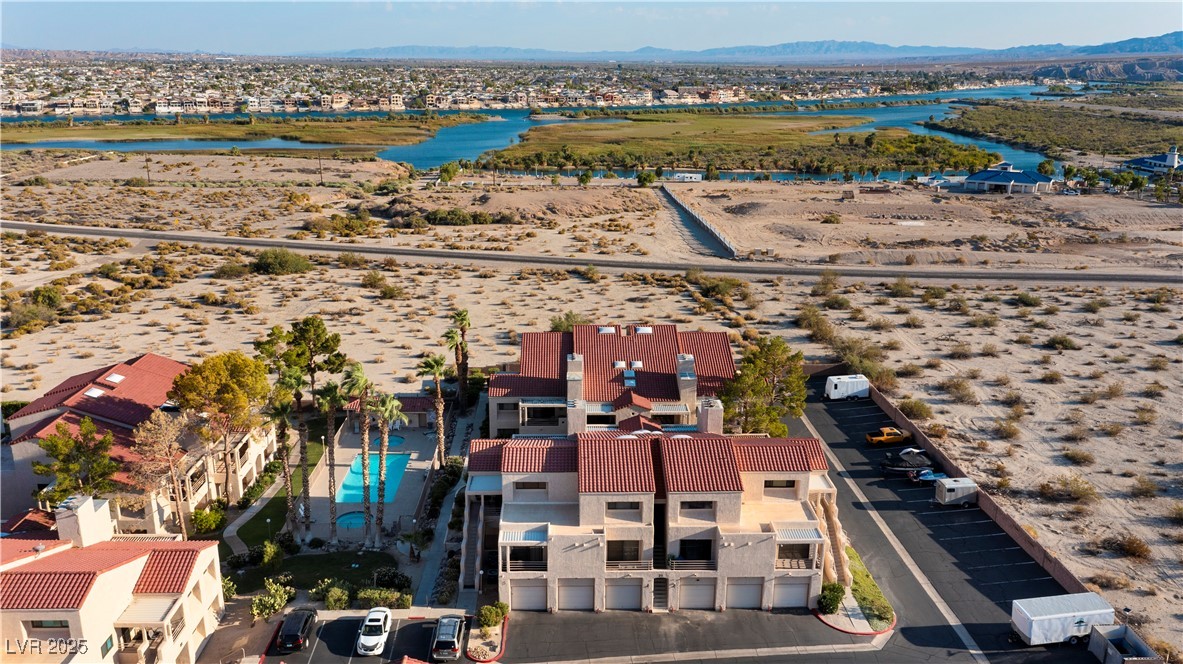 3859 Desert Marina Drive, Unit 257 Laughlin, NV 89029 - Photo 79 of 89 Aerial view of residential area with a water and m