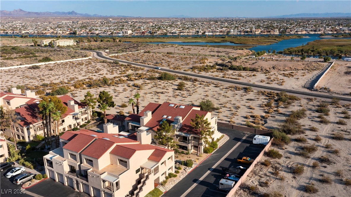 3859 Desert Marina Drive, Unit 257 Laughlin, NV 89029 - Photo 80 of 89 Aerial view of residential area featuring a mounta