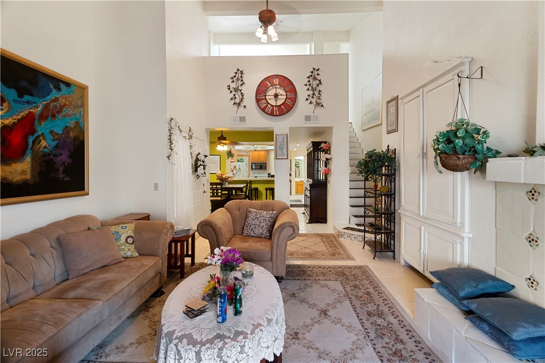 3859 Desert Marina Drive, Unit 257 Laughlin, NV 89029 - Photo 8 of 89 Living area with stairs, tile patterned flooring,