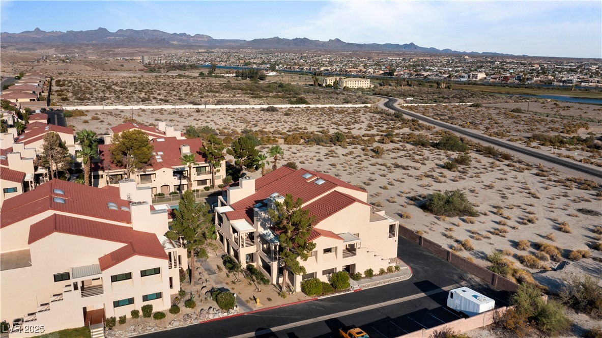 3859 Desert Marina Drive, Unit 257 Laughlin, NV 89029 - Photo 82 of 89 Aerial perspective of suburban area featuring a mo