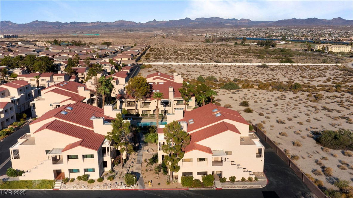 3859 Desert Marina Drive, Unit 257 Laughlin, NV 89029 - Photo 83 of 89 Aerial perspective of suburban area with a mountai