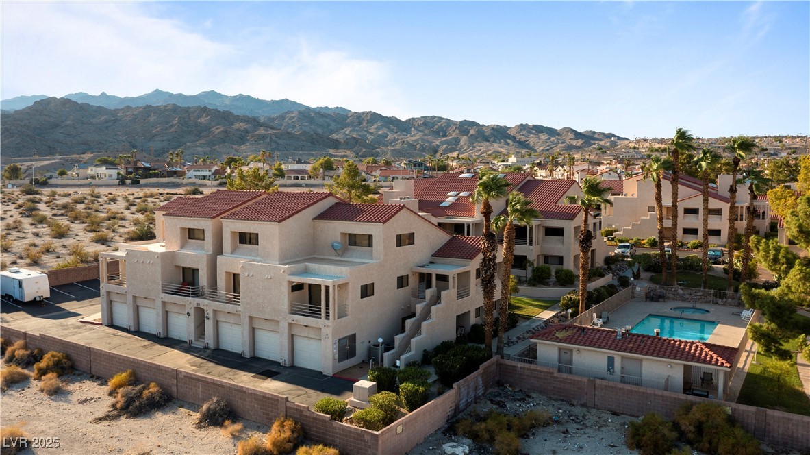3859 Desert Marina Drive, Unit 257 Laughlin, NV 89029 - Photo 89 of 89 Aerial perspective of suburban area featuring moun