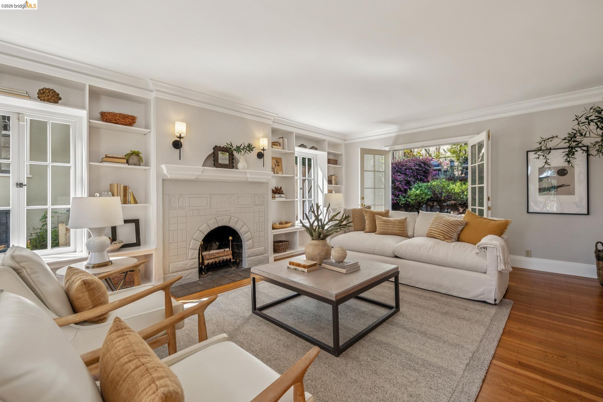 900 Rosemount Road Oakland, CA 94610 - Photo 14 of 59 a living room with furniture and a fireplace
