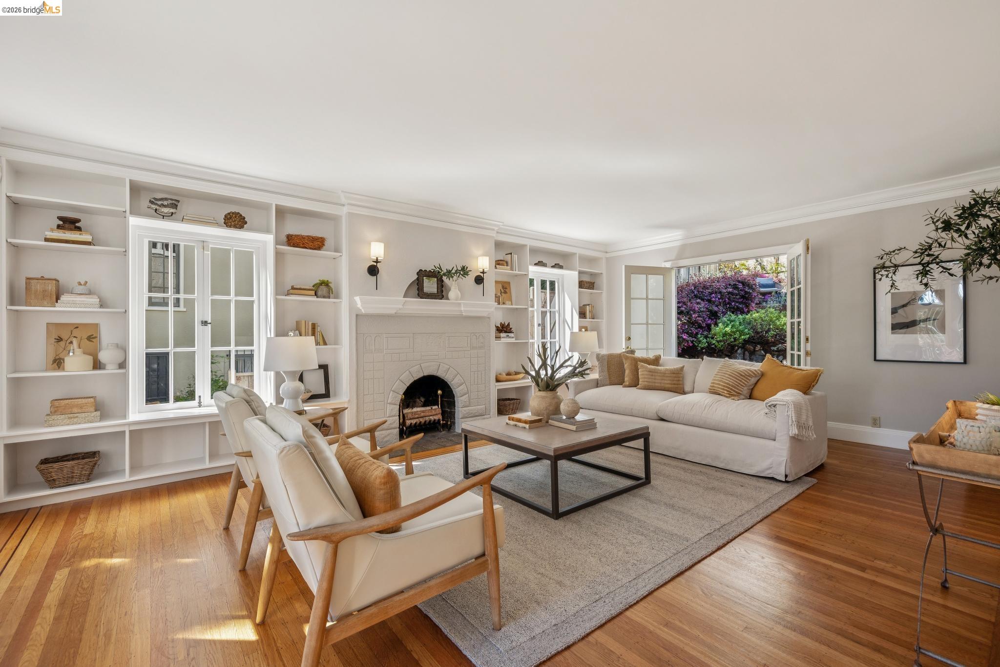 900 Rosemount Road Oakland, CA 94610 - Photo 15 of 59 a living room with furniture and a fireplace