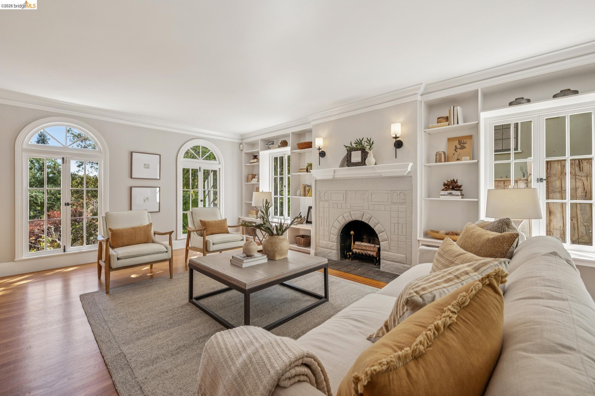 900 Rosemount Road Oakland, CA 94610 - Photo 20 of 59 a living room with furniture fireplace and window