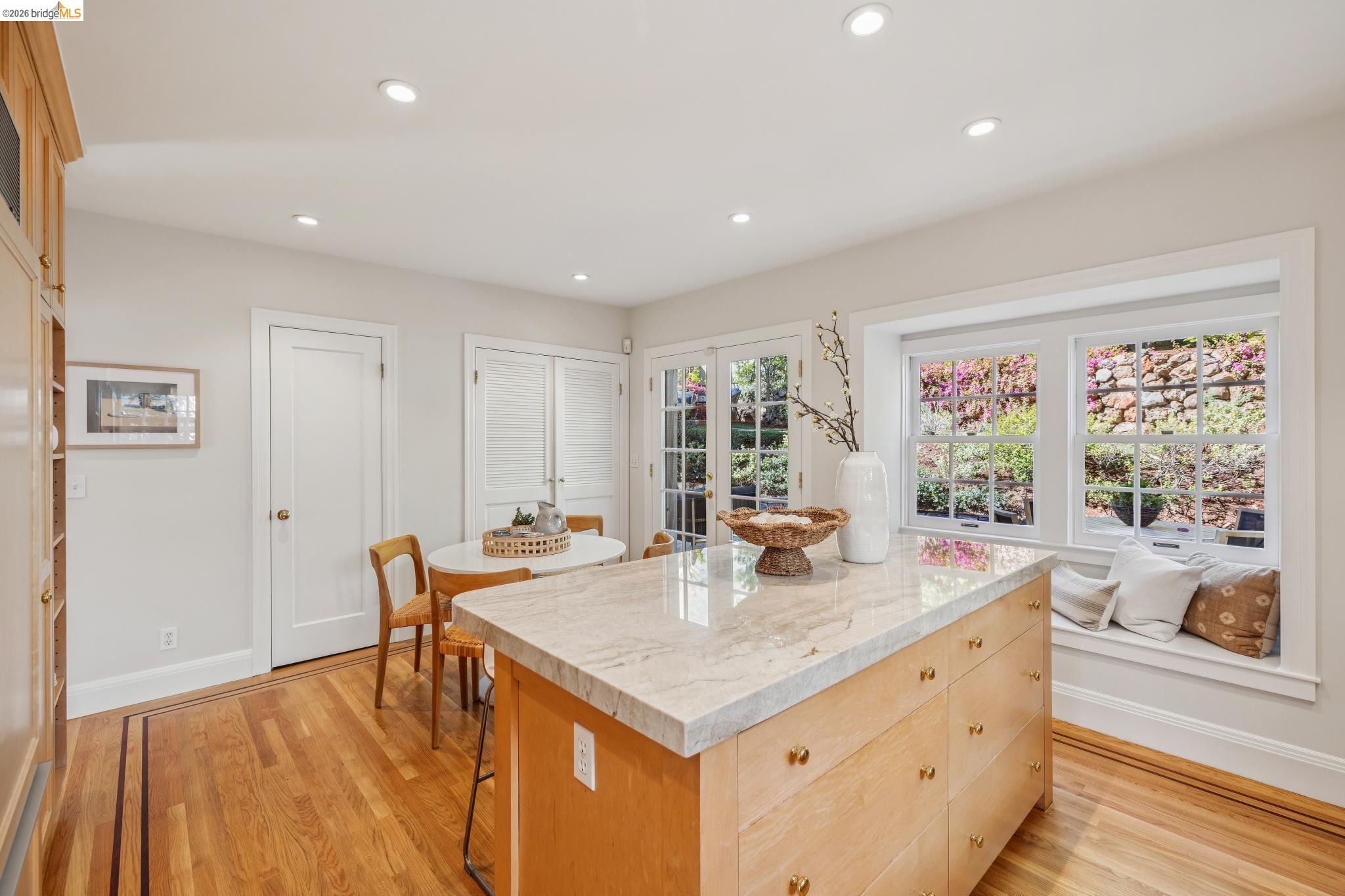 900 Rosemount Road Oakland, CA 94610 - Photo 30 of 59 a view of a kitchen wooden floor and a living room