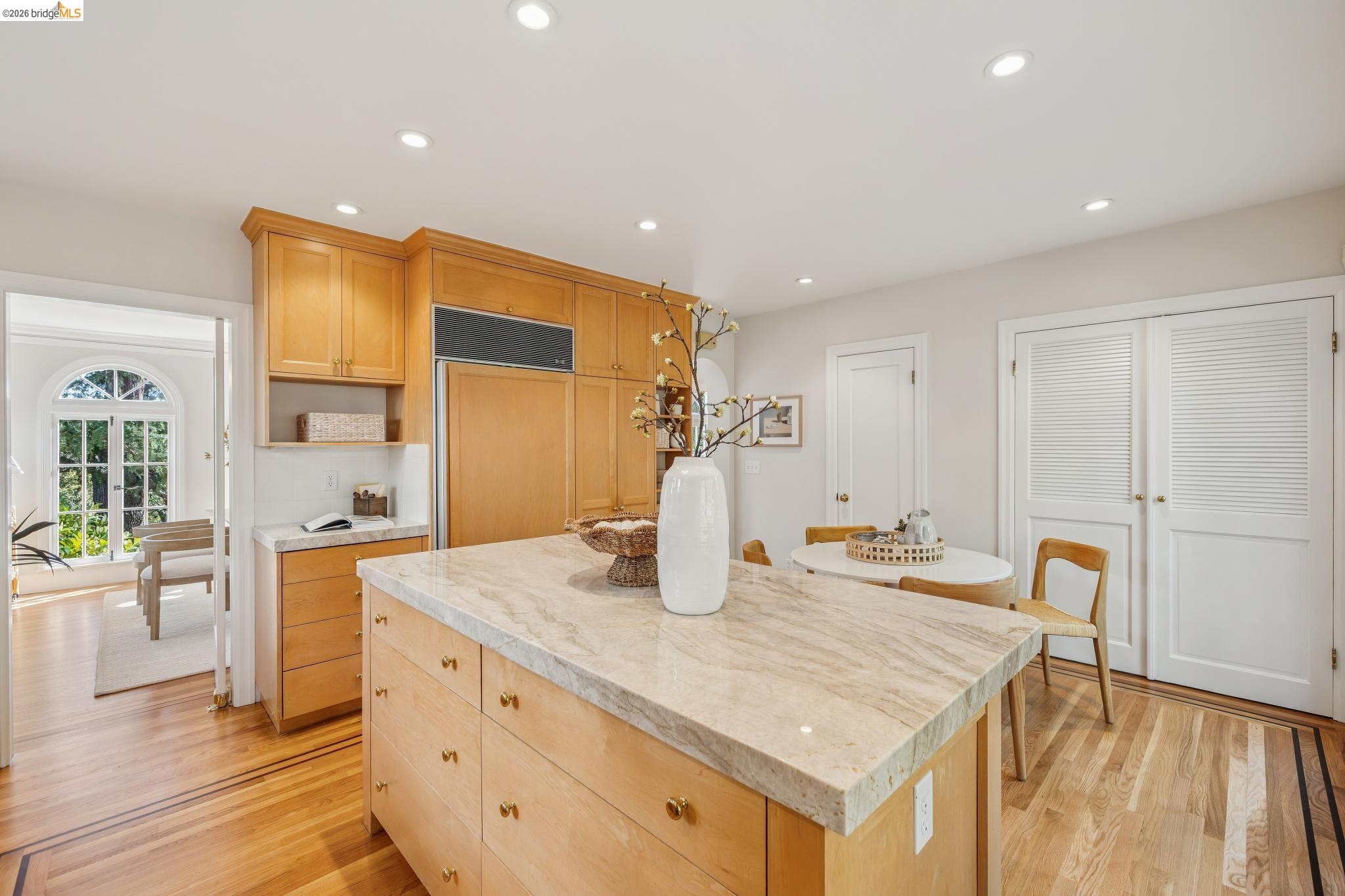 900 Rosemount Road Oakland, CA 94610 - Photo 31 of 59 a kitchen with stainless steel appliances granite countertop a sink and a refrigerator