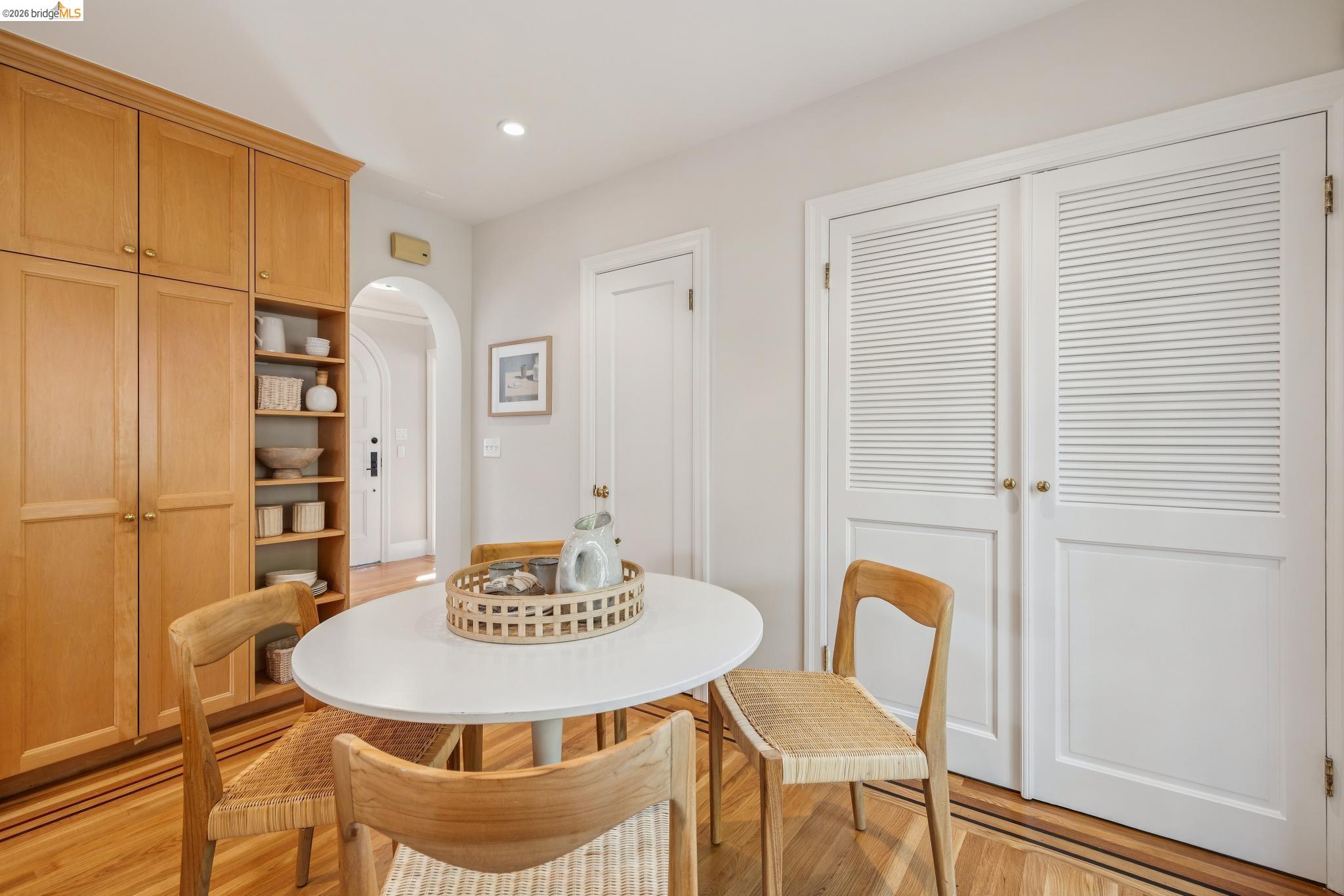 900 Rosemount Road Oakland, CA 94610 - Photo 33 of 59 a view of a dining room with furniture and wooden floor