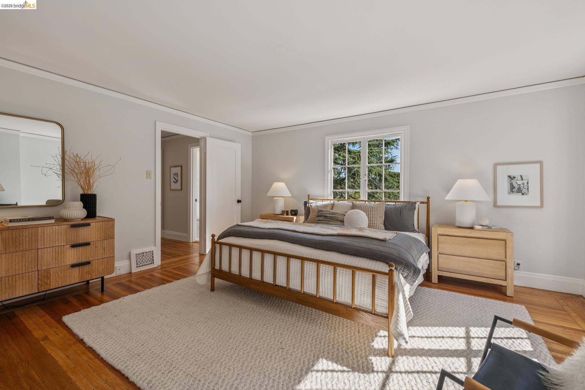 900 Rosemount Road Oakland, CA 94610 - Photo 44 of 59 a bedroom with a bed and a dresser