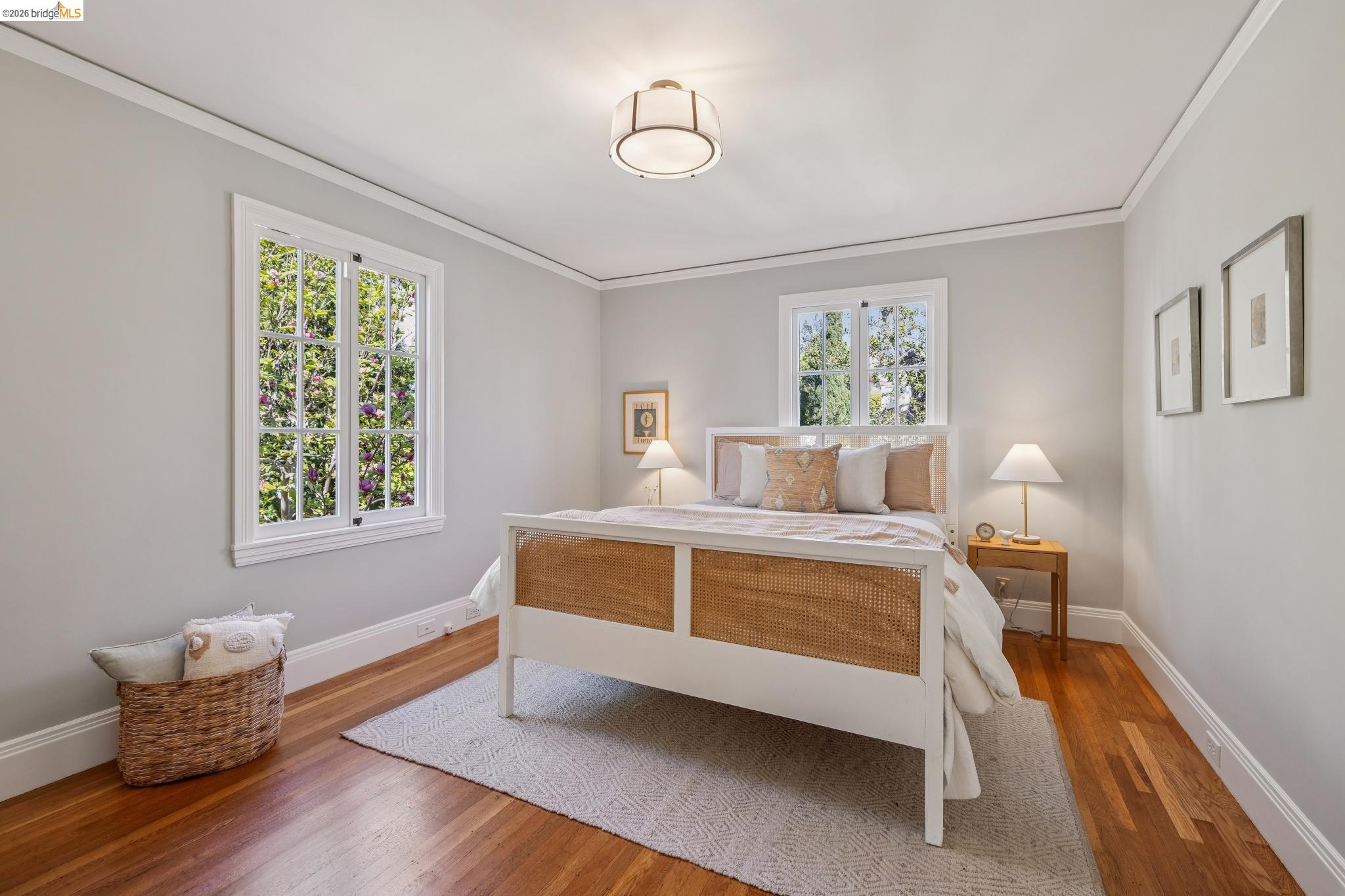 900 Rosemount Road Oakland, CA 94610 - Photo 48 of 59 a bedroom with a bed and window