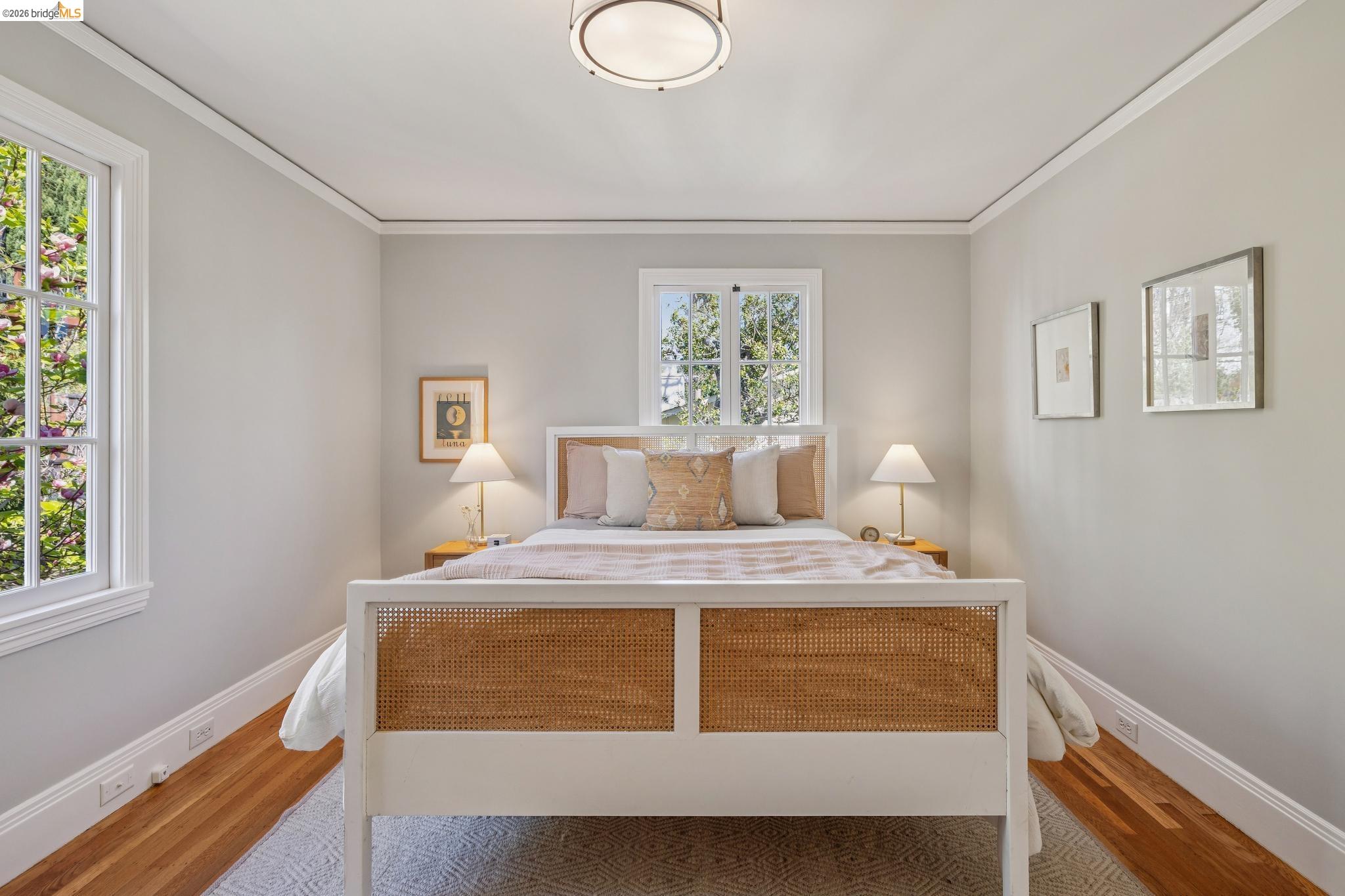 900 Rosemount Road Oakland, CA 94610 - Photo 49 of 59 a bedroom with a bed and a window