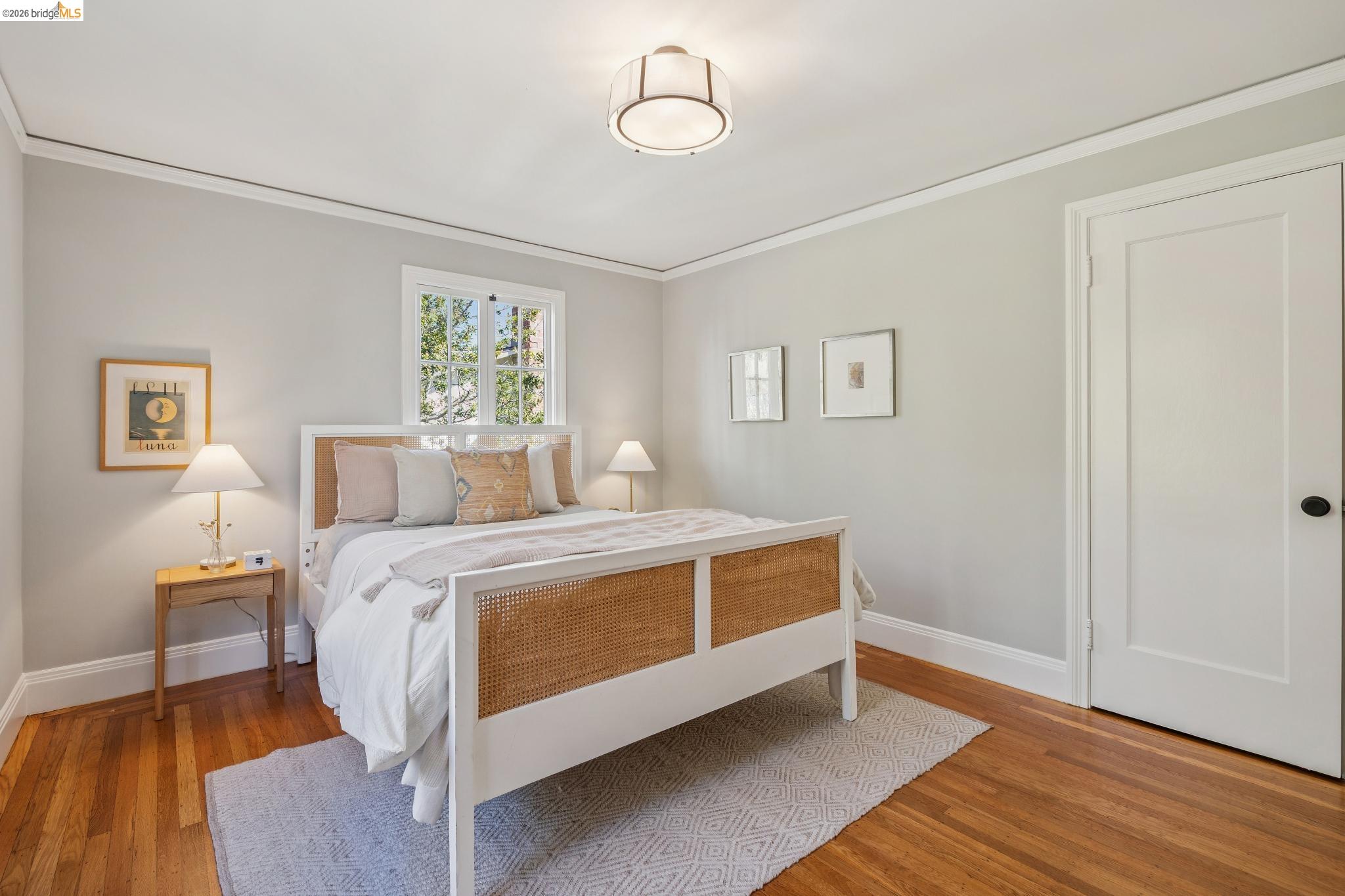 900 Rosemount Road Oakland, CA 94610 - Photo 50 of 59 a bed room with a bed and a window