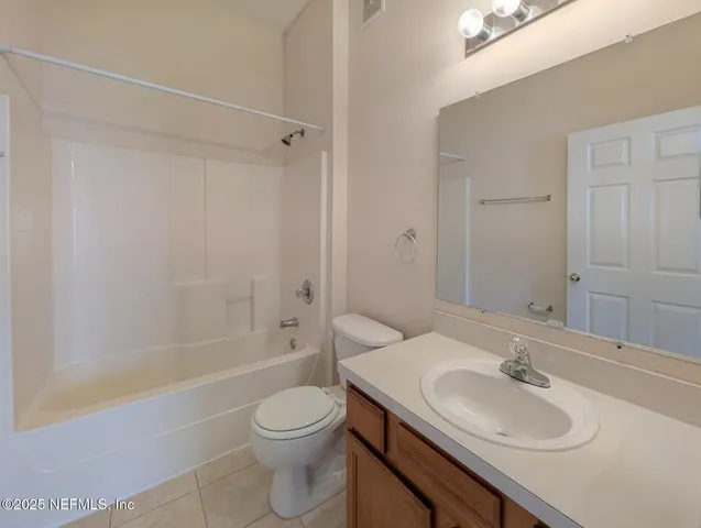 a bathroom with a sink a toilet and a bathtub