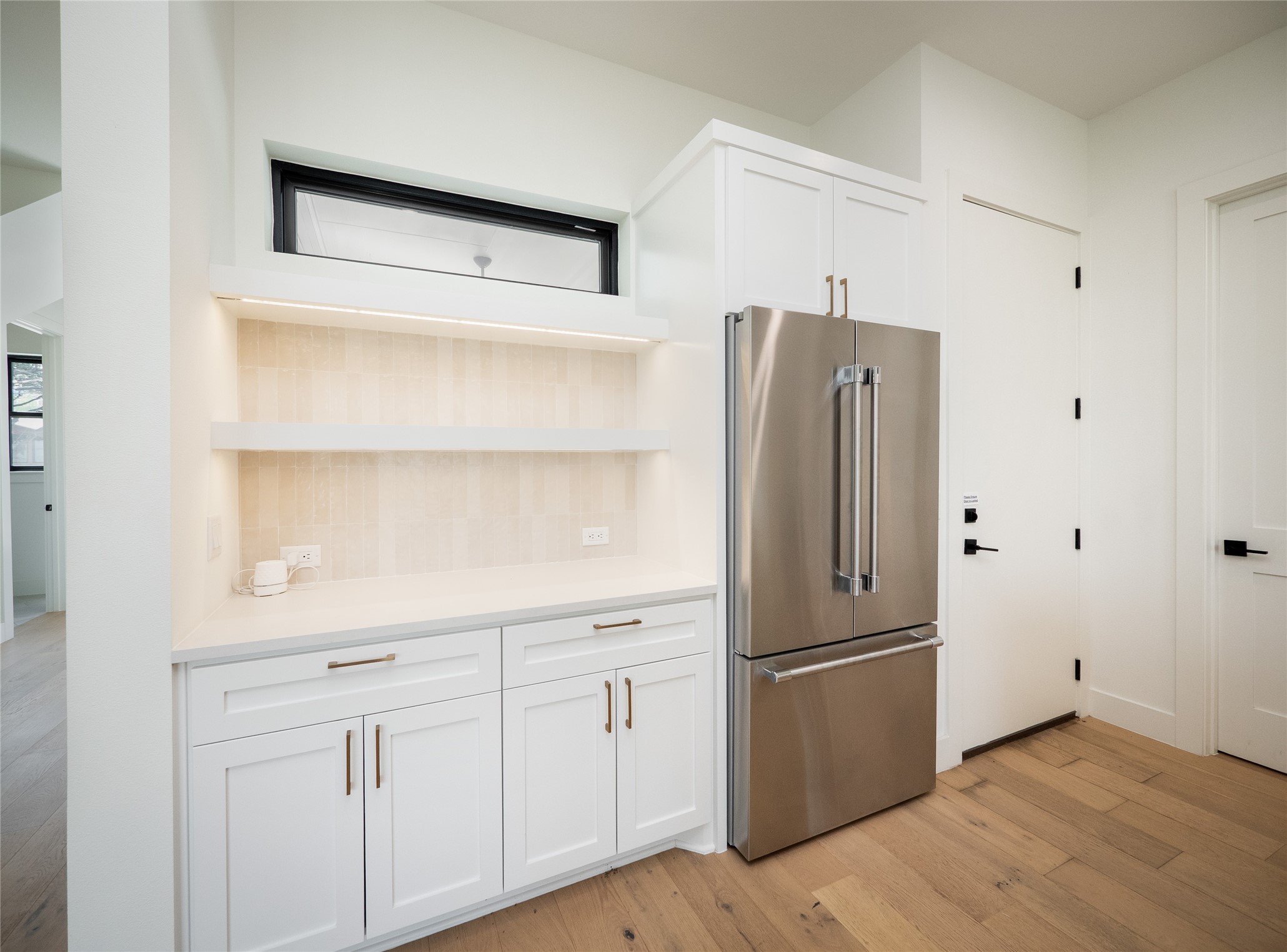 814 Stark Street Austin, TX 78756 - Photo 12 of 39 a kitchen with cabinets and stainless steel appliances