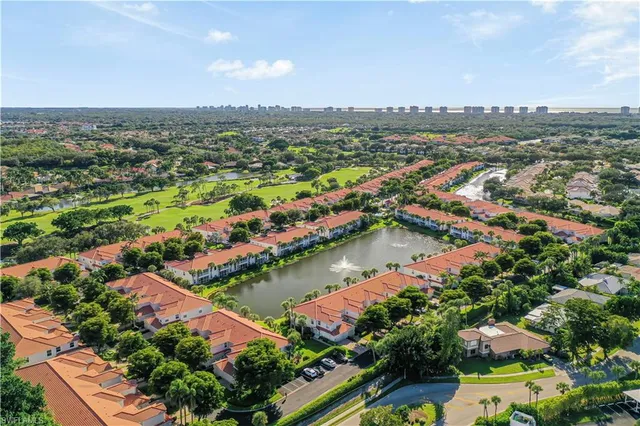 an aerial view of lake residential houses with outdoor space and lake view