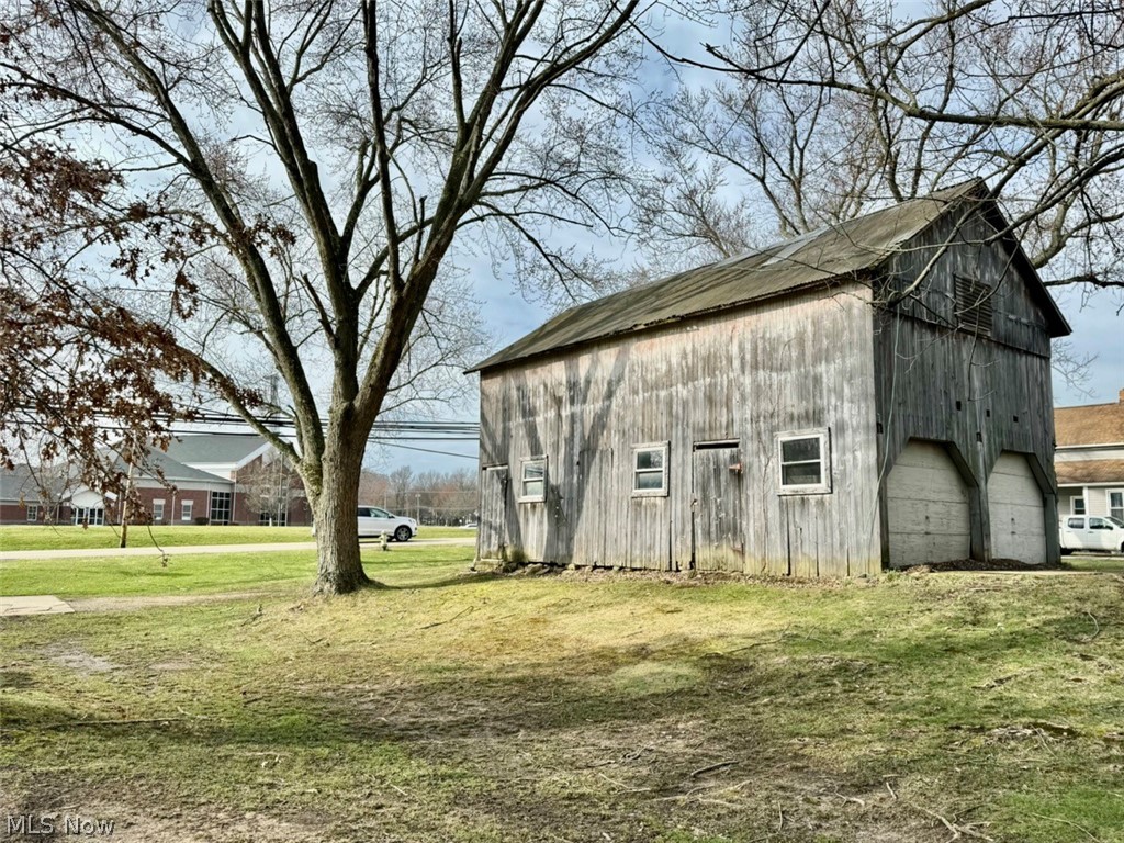 1445 Killian Road Akron, OH 44312 - Photo 3 of 21 View of barn with a lawn
