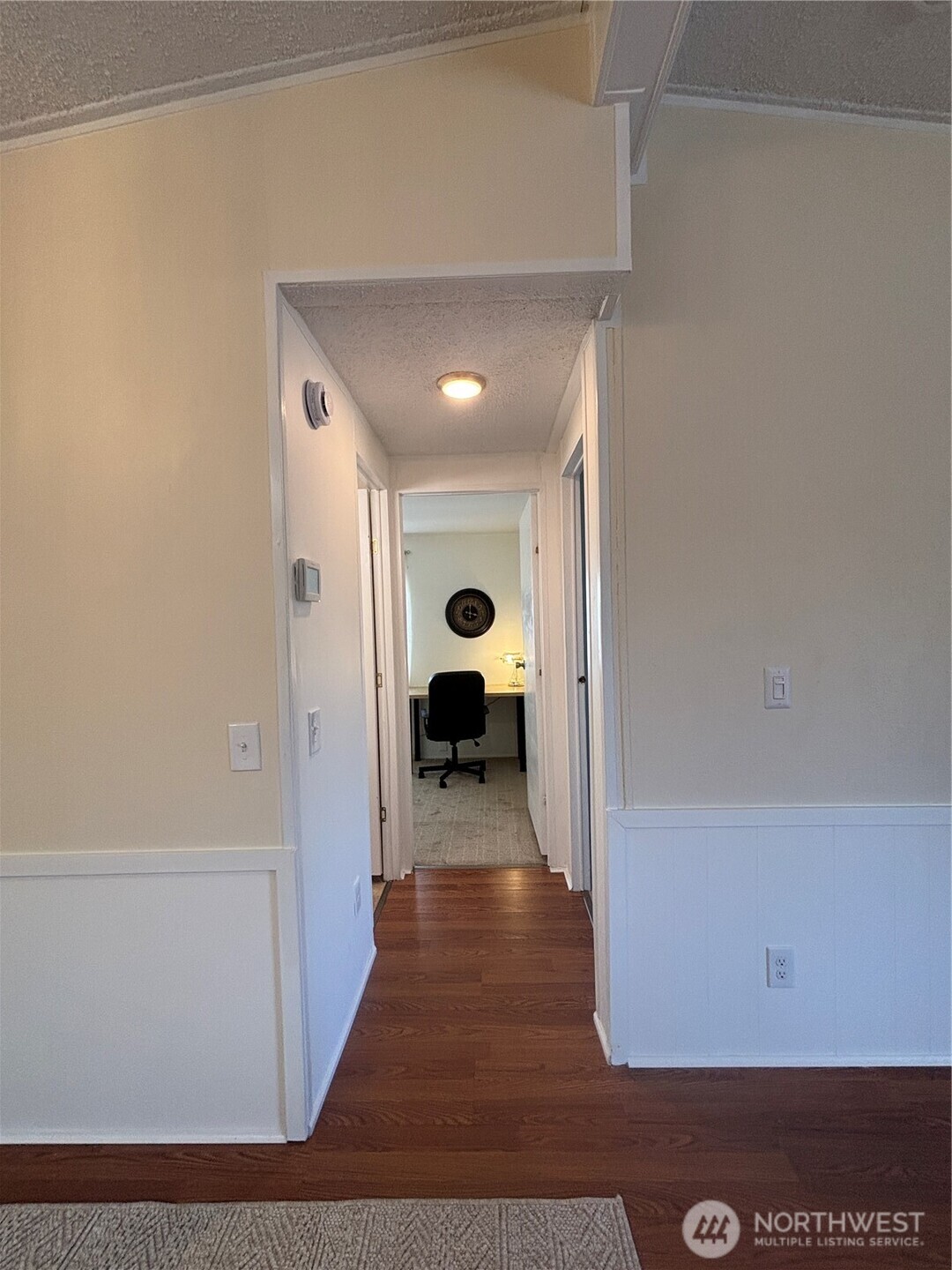 930 Trosper Road Southwest, Unit 130 Tumwater, WA 98512 - Photo 5 of 14 a view of a hallway with a room