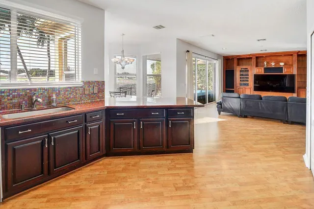 a bedroom with a bed and a table