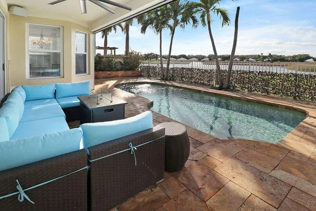 a bedroom with a bed lamp closet on table and a window