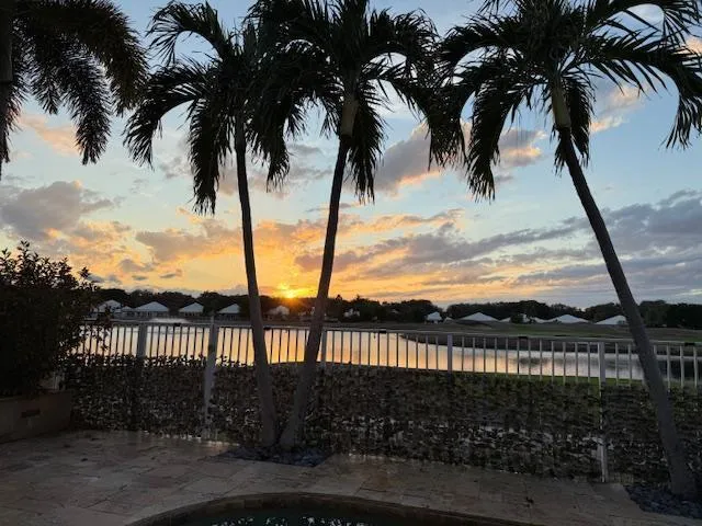 a room with furniture pool table and a rug