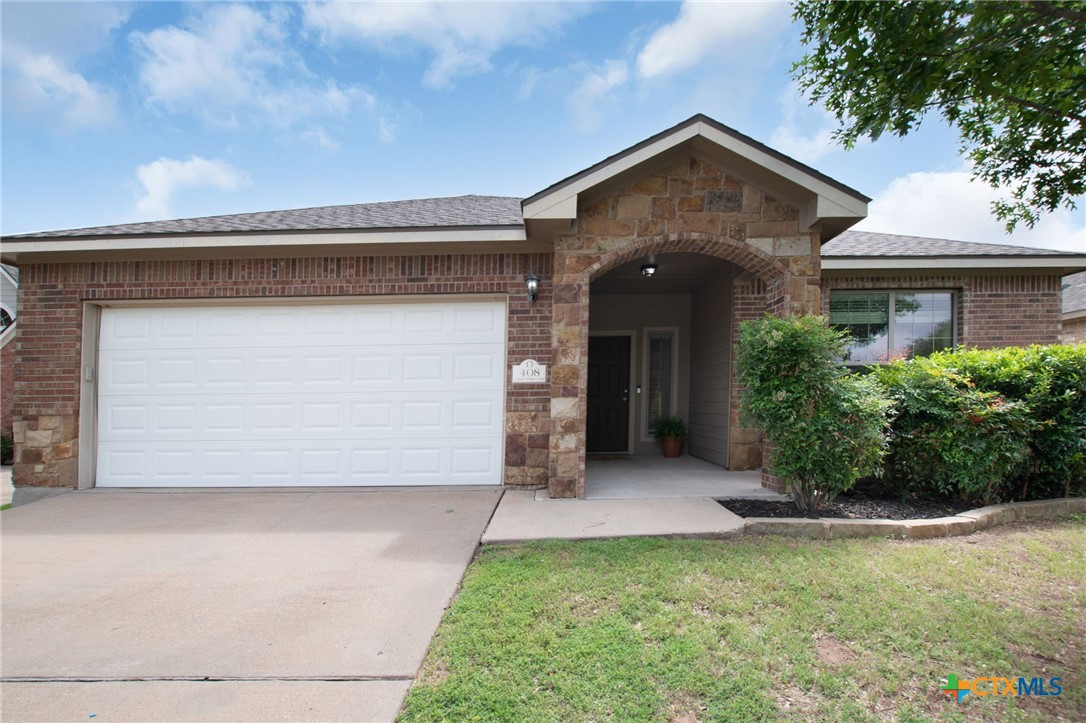 408 Copper Ridge Loop Temple, TX 76502 - Photo 1 of 39 4-bedroom brick and stone home in the gated Hills of Westwood community