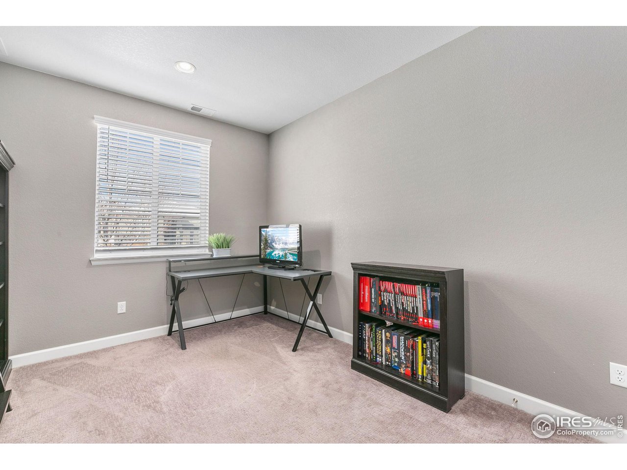 5231 Osbourne Drive Windsor, CO 80550 - Photo 18 of 20 a workspace with furniture and window