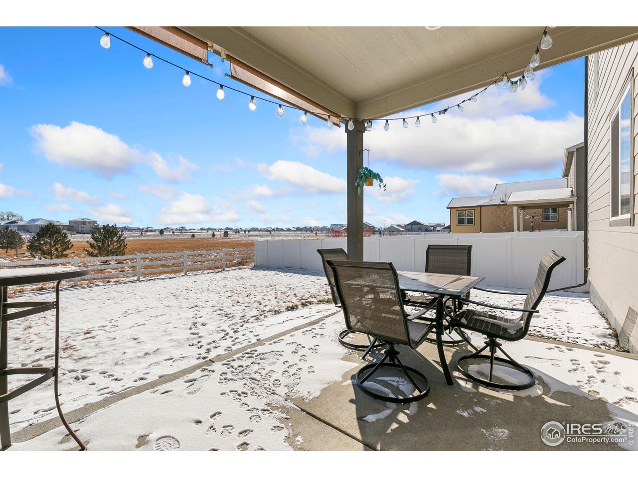 5231 Osbourne Drive Windsor, CO 80550 - Photo 20 of 20 a view of a terrace with seating space