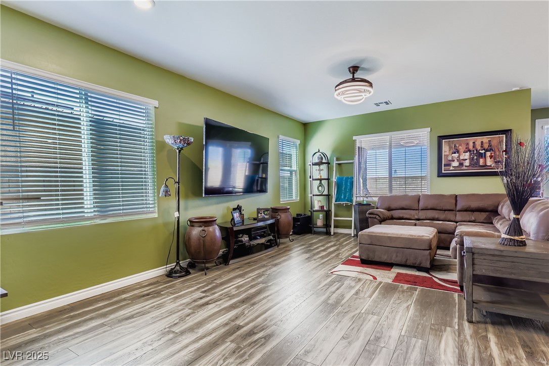 314 Robson Rdg Lane Henderson, NV 89015 - Photo 15 of 64 Living area with wood finished floors and baseboards