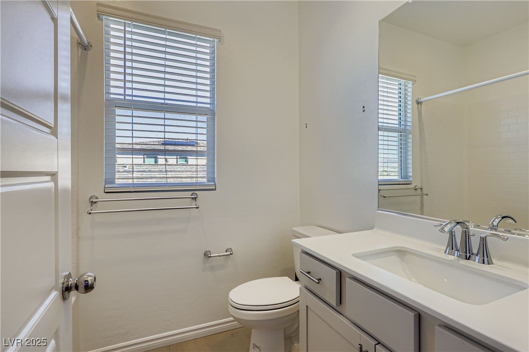 314 Robson Rdg Lane Henderson, NV 89015 - Photo 27 of 64 Bathroom with vanity and a shower