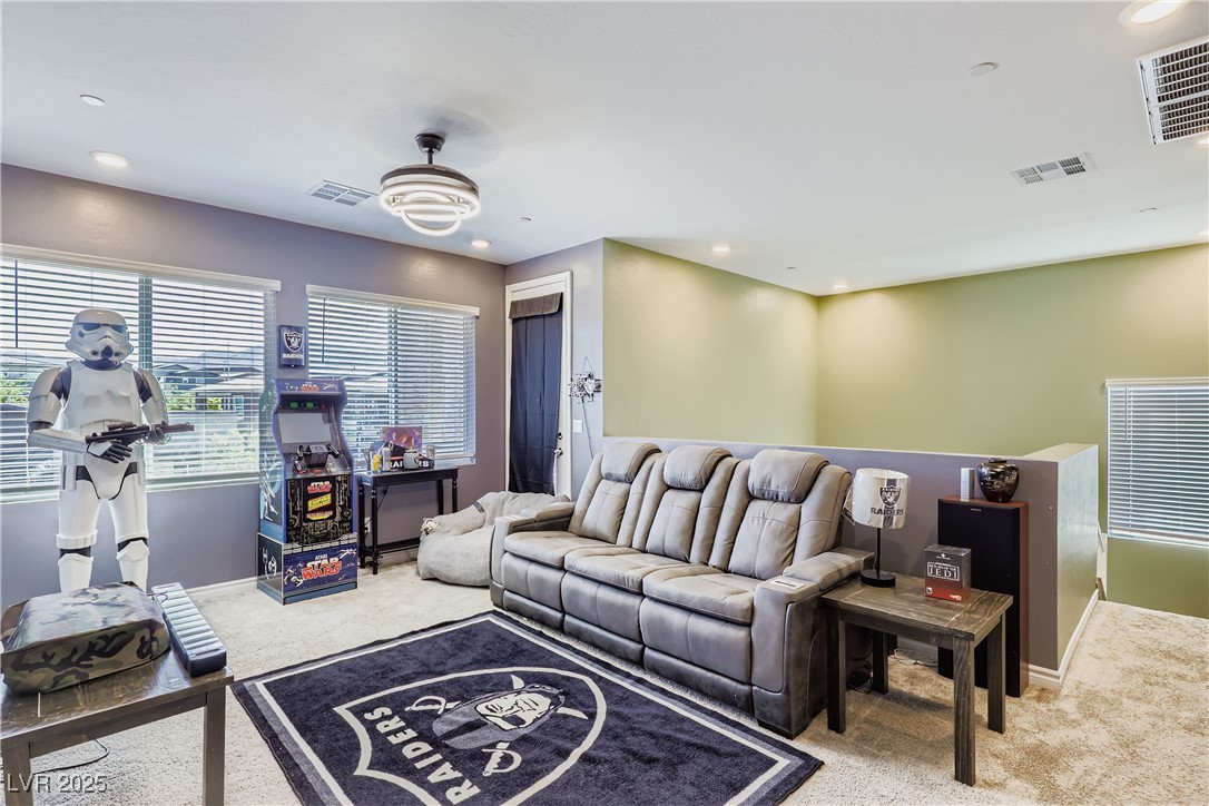 314 Robson Rdg Lane Henderson, NV 89015 - Photo 30 of 64 Carpeted living room featuring recessed lighting and baseboards