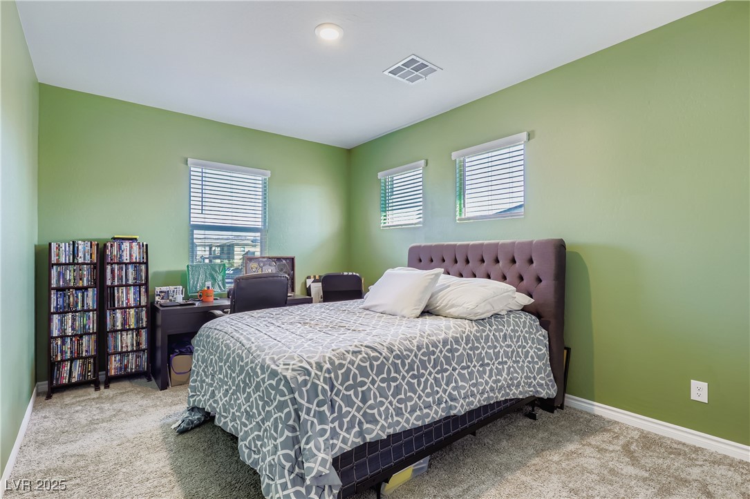 314 Robson Rdg Lane Henderson, NV 89015 - Photo 32 of 64 Carpeted bedroom featuring baseboards