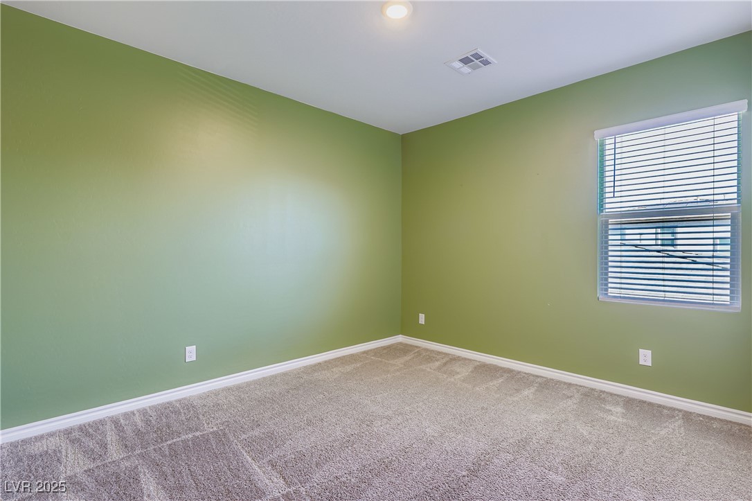 314 Robson Rdg Lane Henderson, NV 89015 - Photo 36 of 64 Unfurnished room with carpet floors and baseboards