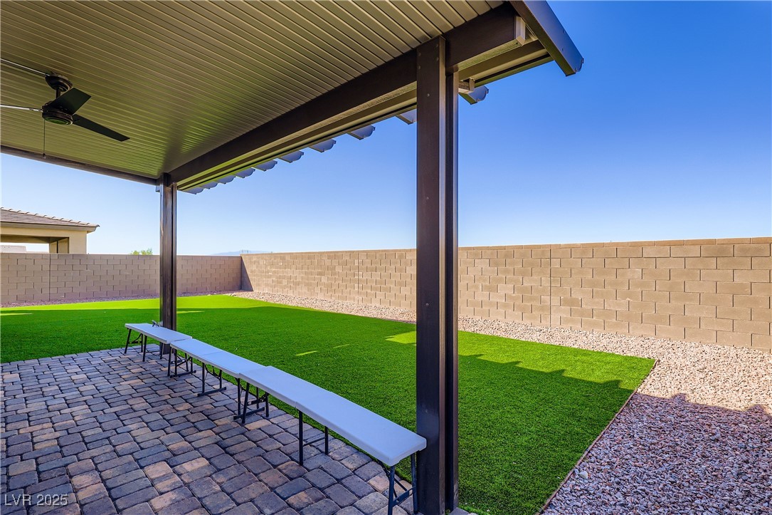 314 Robson Rdg Lane Henderson, NV 89015 - Photo 52 of 64 Fenced backyard featuring a patio and a ceiling fan