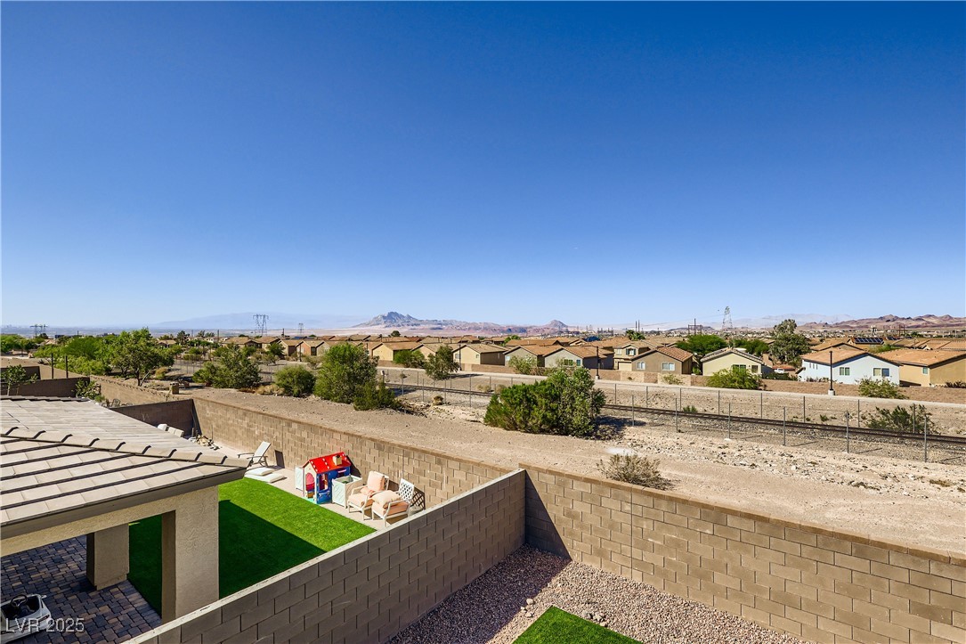 314 Robson Rdg Lane Henderson, NV 89015 - Photo 53 of 64 Fenced backyard with a residential view