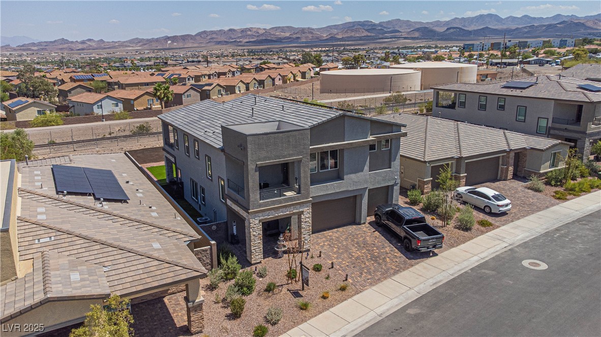 314 Robson Rdg Lane Henderson, NV 89015 - Photo 54 of 64 Aerial perspective of suburban area featuring a mountain backdrop