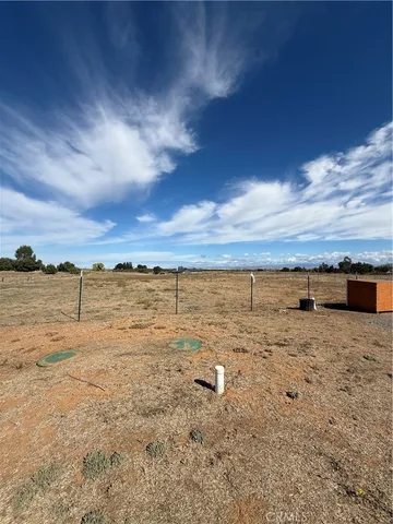 a view of ocean with sunset