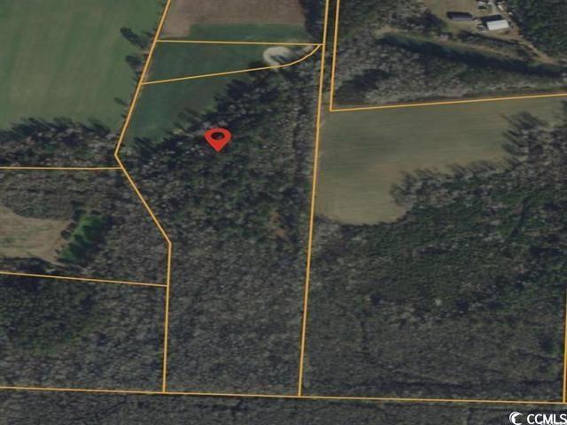 Aerial map of property and surrounding area with property parcel outlined