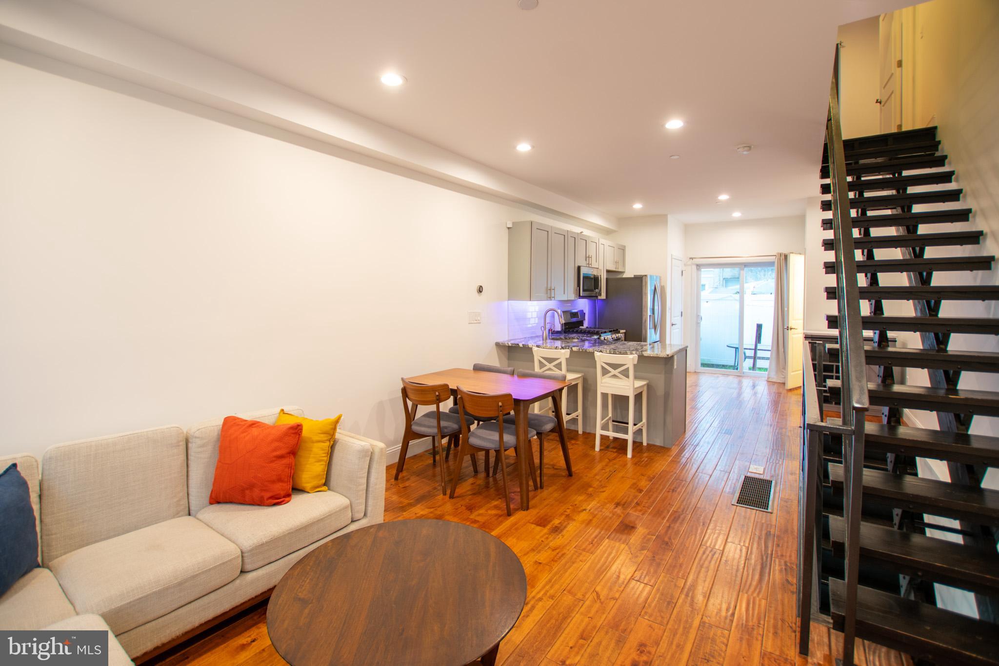 1910 Fernon Street Philadelphia, PA 19145 - Photo 2 of 44 a living room with furniture and wooden floor