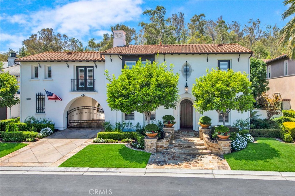 10835 Turnleaf Lane Tustin, CA 92782 - Photo 1 of 1 a front view of a house with garden