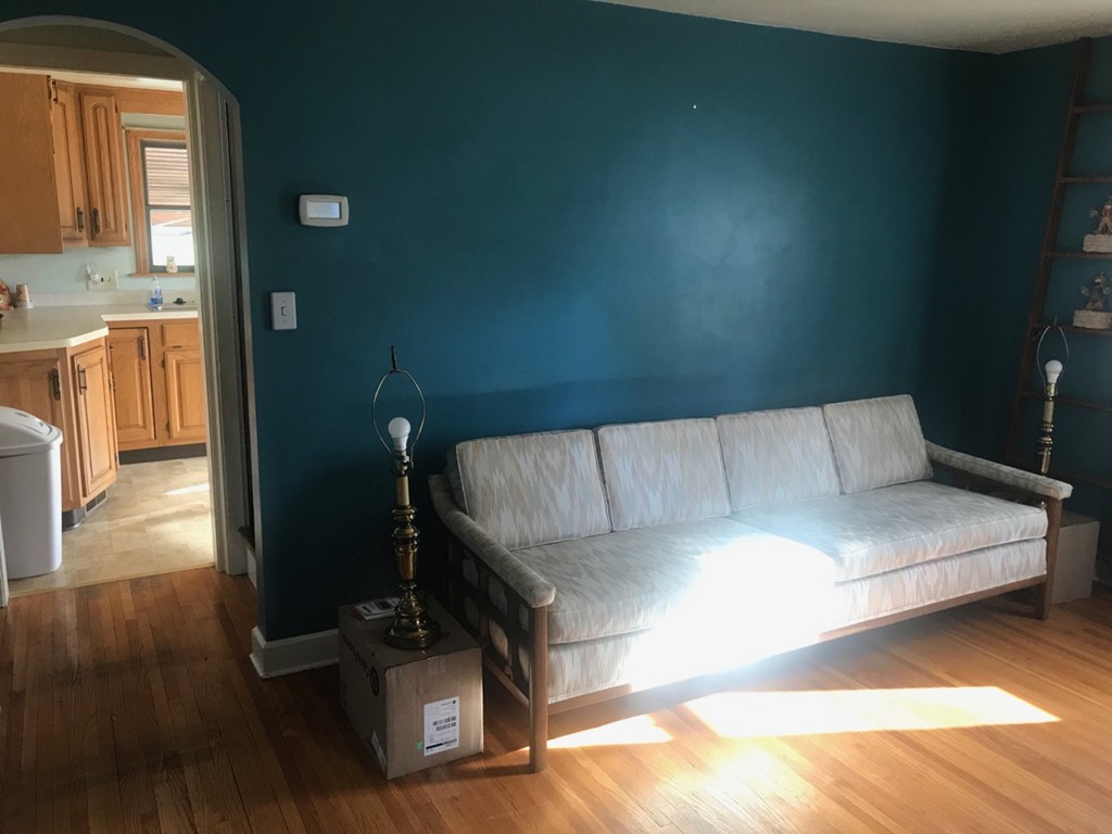 133 Russell Street Springfield, MA 01104 - Photo 5 of 15 a living room with furniture and a wooden floor