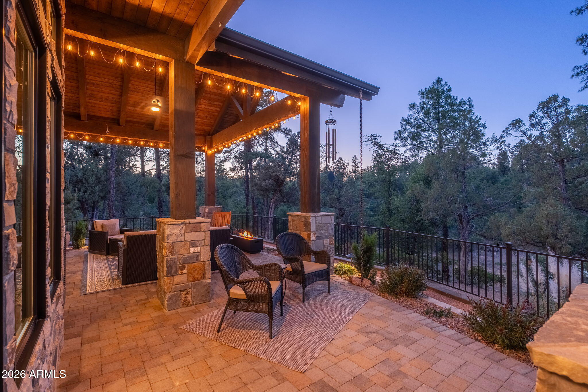 602 North Redbud Circle Payson, AZ 85541 - Photo 65 of 83 a view of a patio with a dining table and chairs with wooden fence