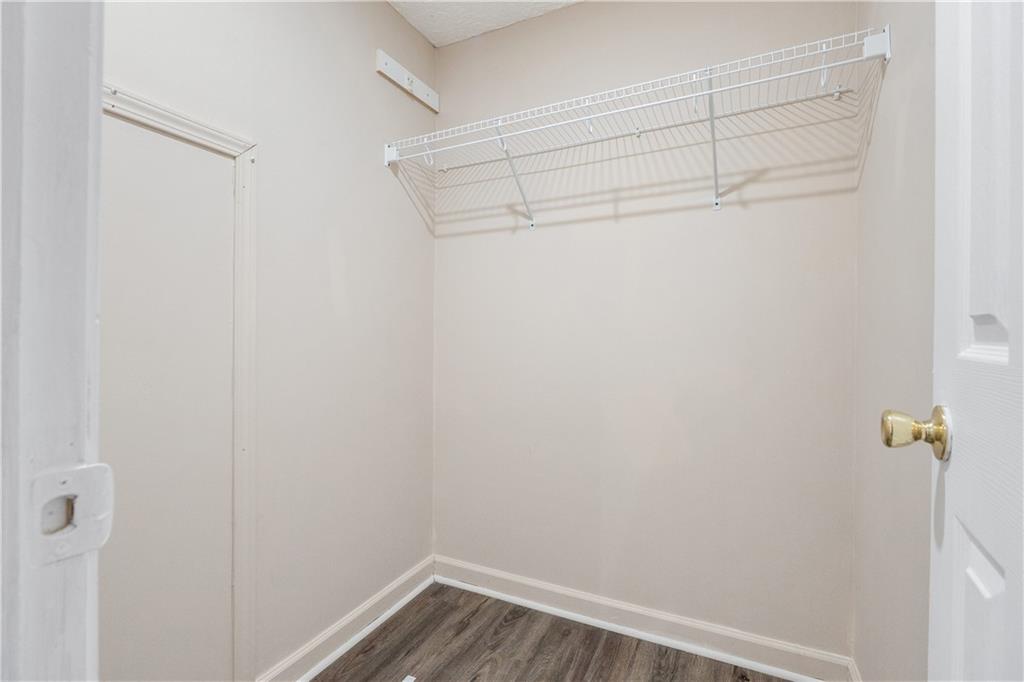 5498 Woodlin Road Lula, GA 30554 - Photo 17 of 40 a view of small space with racks on the wall