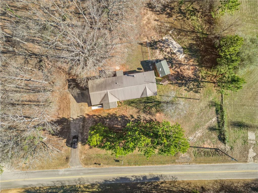 5498 Woodlin Road Lula, GA 30554 - Photo 30 of 40 front view of a house with a yard